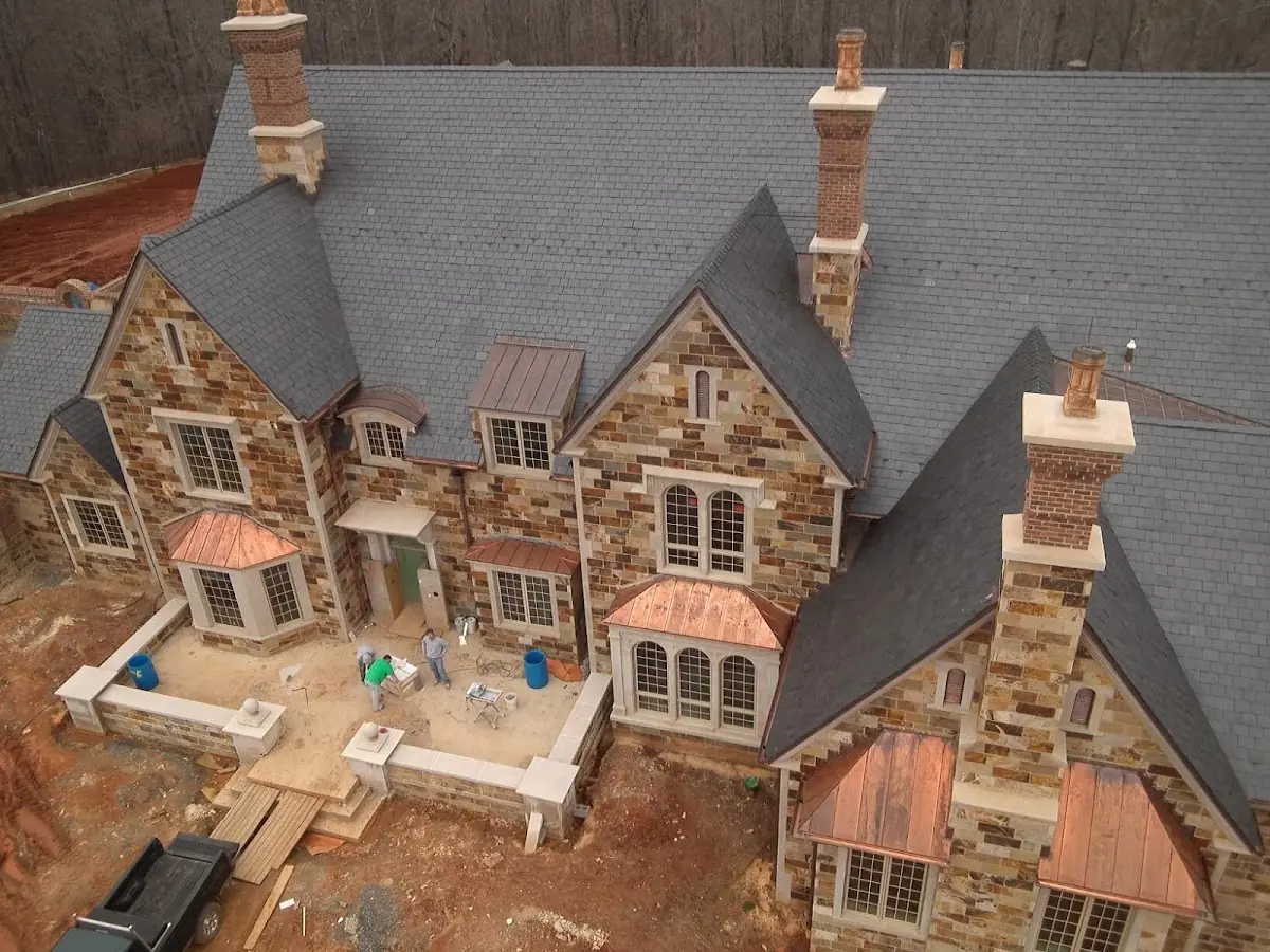 Craftsman Roofing Slate Roof Repair project in Tiger Lily